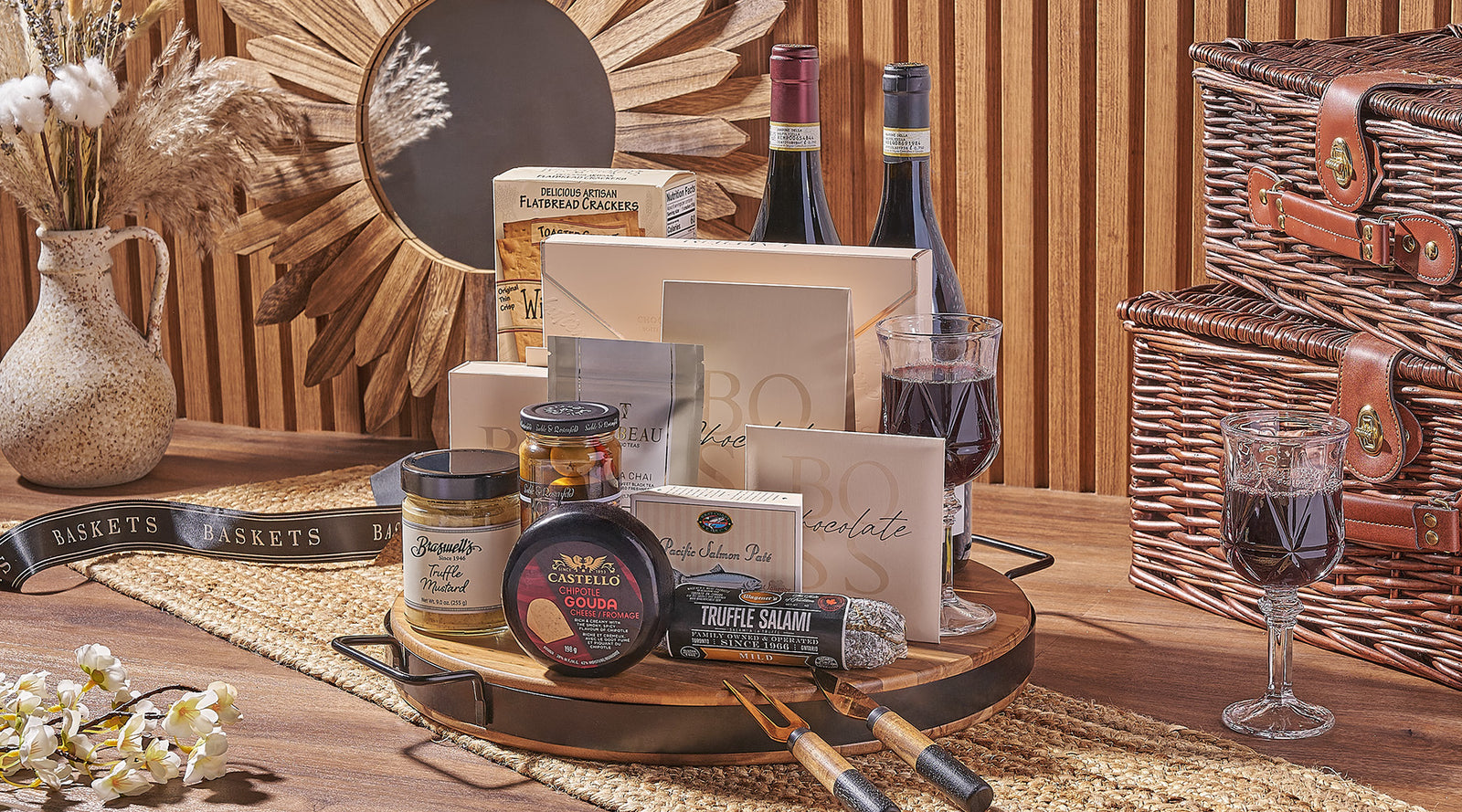 Elegant gourmet gift basket with wine and delicacies.